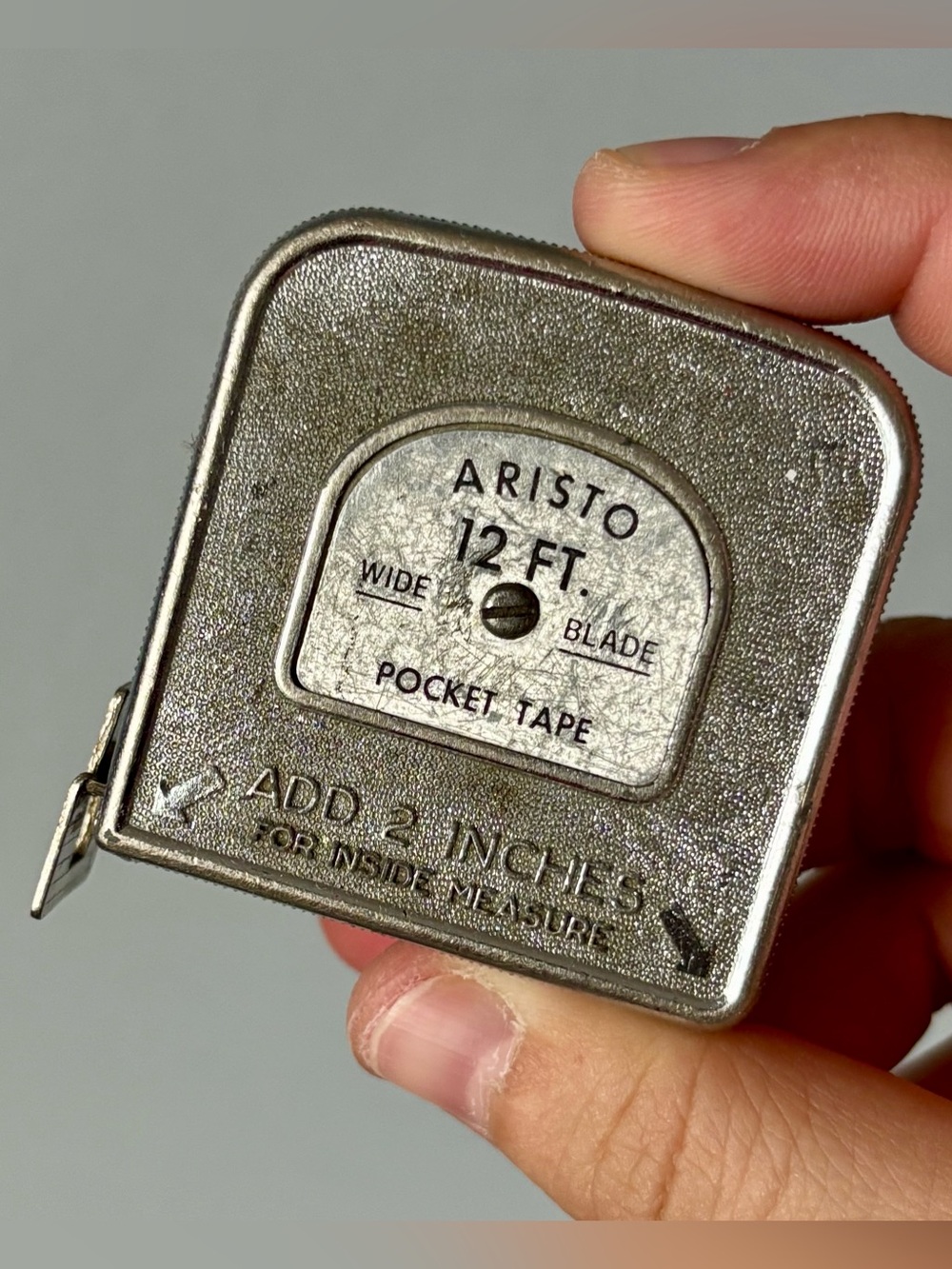 Vintage Aristo 12 ft pocket metal tape measure (decimal equivalent, made in USA)